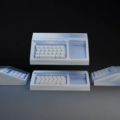 Máy tính Mini TI 994a với Parsec làm móc khóa