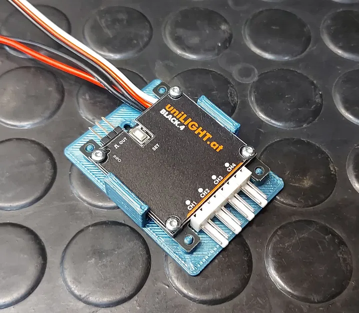 Giá đỡ cho mô-đun điều khiển LED uniLight Black.4 - Image 1