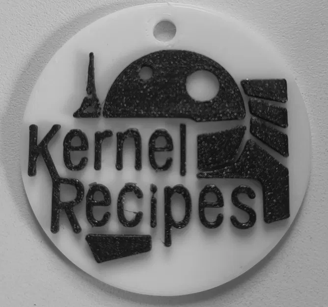 Móc khóa biểu tượng Kernel Recipes độc đáo - Image 1