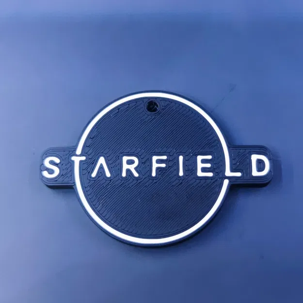 Móc khóa Starfield hai mặt với logo Xbox - Image 1