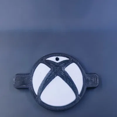 Móc khóa Starfield hai mặt với logo Xbox