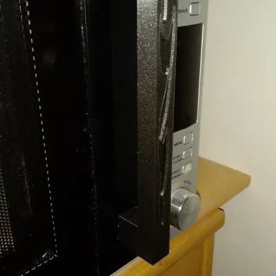 Thay thế tay cầm bị gãy cho cửa lò vi sóng