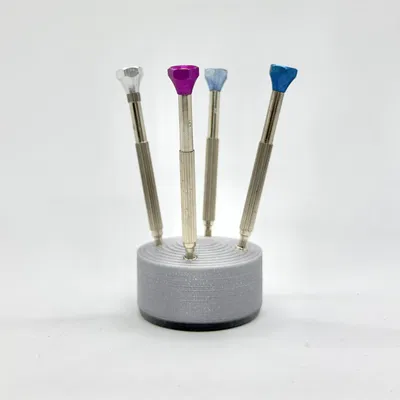 Giá đỡ cho bốn tuốc-nơ-vít đồng hồ nhỏ