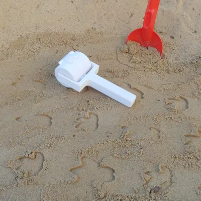 Xe lăn cát cho trẻ em với các con lăn thay đổi