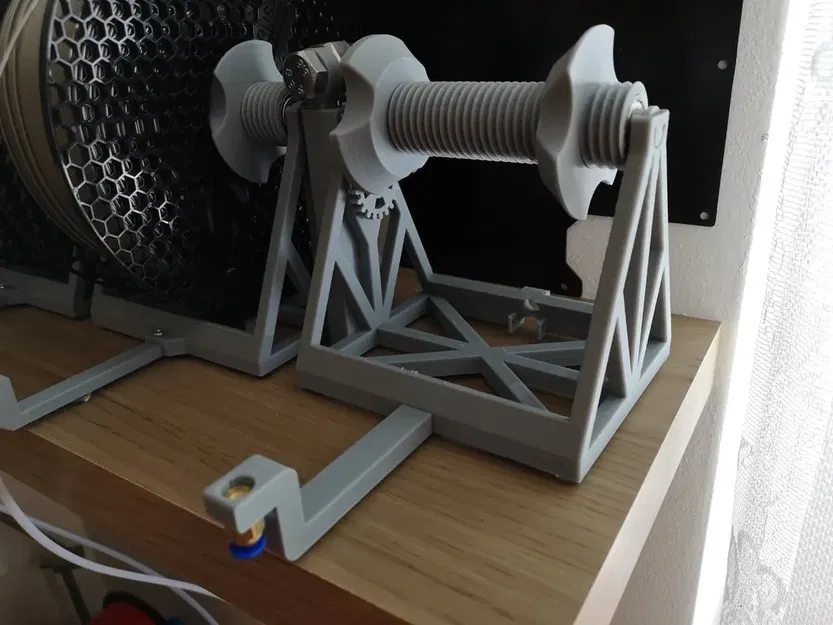 Giá đỡ cuộn filament với tay dài cho cơ chế tự cuốn nhiều l... - Image 1