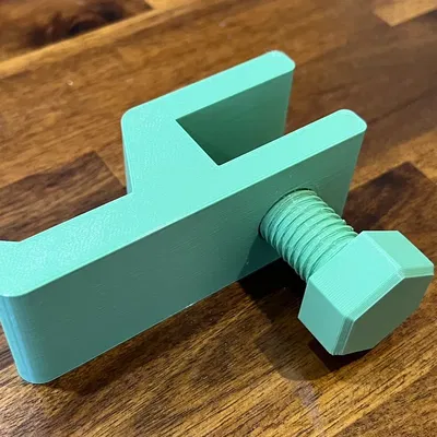 Kẹp bàn cho tai nghe in 3D màu xanh hạt dẻ