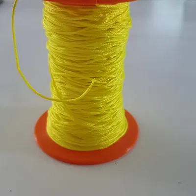 Cuộn chỉ cho dây mảnh dễ dàng quấn bằng trục khoan