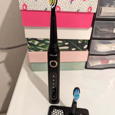 Giá đỡ bàn chải đánh răng Fairywill D7 và 2 đầu bàn chải