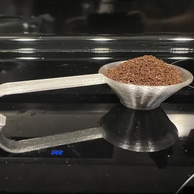 Muỗng cà phê đo 15g hạt cà phê với dung tích 26.737ml