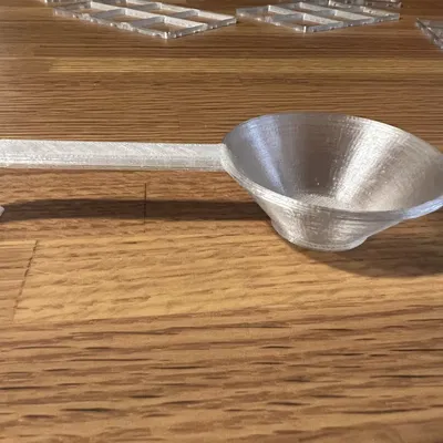 Muỗng cà phê đo 15g hạt cà phê với dung tích 26.737ml