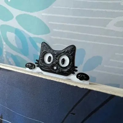 Dấu sách mèo đang peek qua trang sách