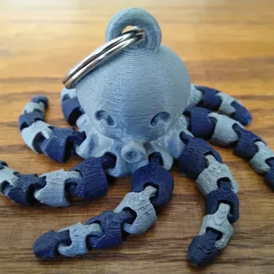 Móc khóa bạch tuộc mini dễ thương với thiết kế hai màu