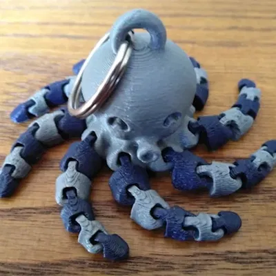 Móc khóa bạch tuộc mini dễ thương với thiết kế hai màu