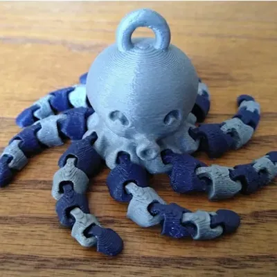 Móc khóa bạch tuộc mini dễ thương với thiết kế hai màu