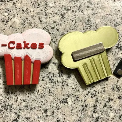 Biểu trưng bánh cupcake cho công ty T-Cakes giả tưởng