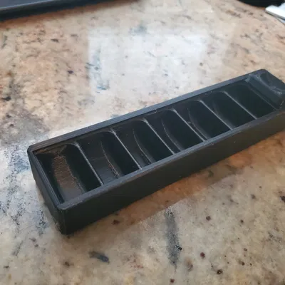 Hộp đựng thuốc 7 ngăn với nắp cuộn linh hoạt