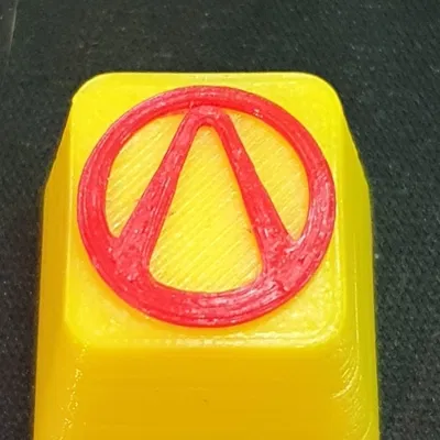 Móc phím Borderlands in màu vàng và đỏ