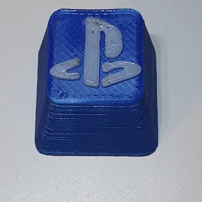 Nút bấm Playstation in màu xanh và trắng