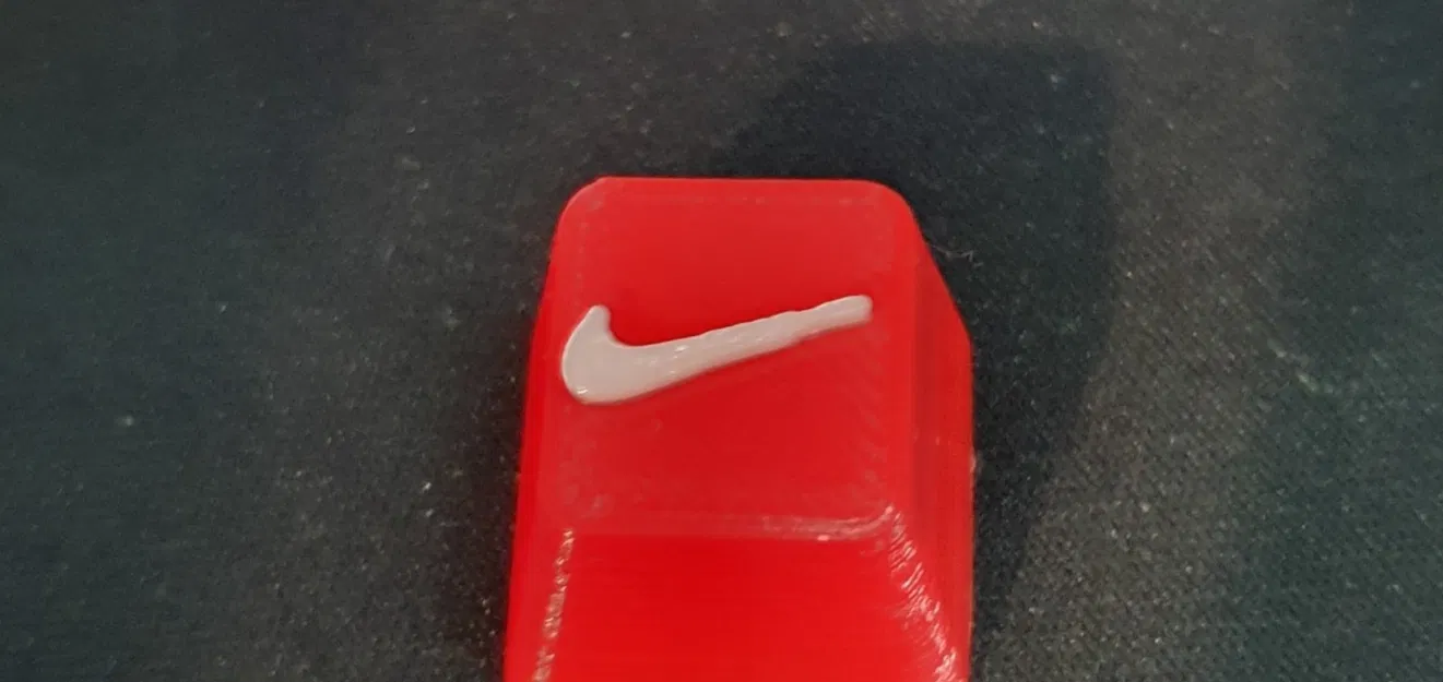 Núm phím Nike in màu Đỏ và Trắng - Image 1