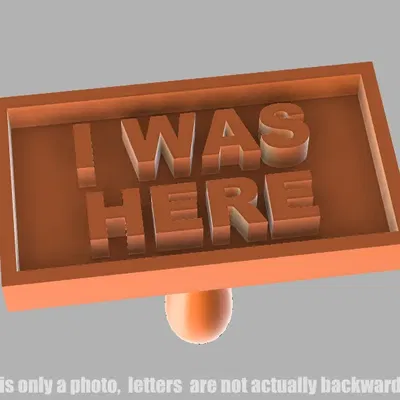 Dấu ấn cát/bùn "TÔI ĐÃ Ở ĐÂY" trên bãi biển