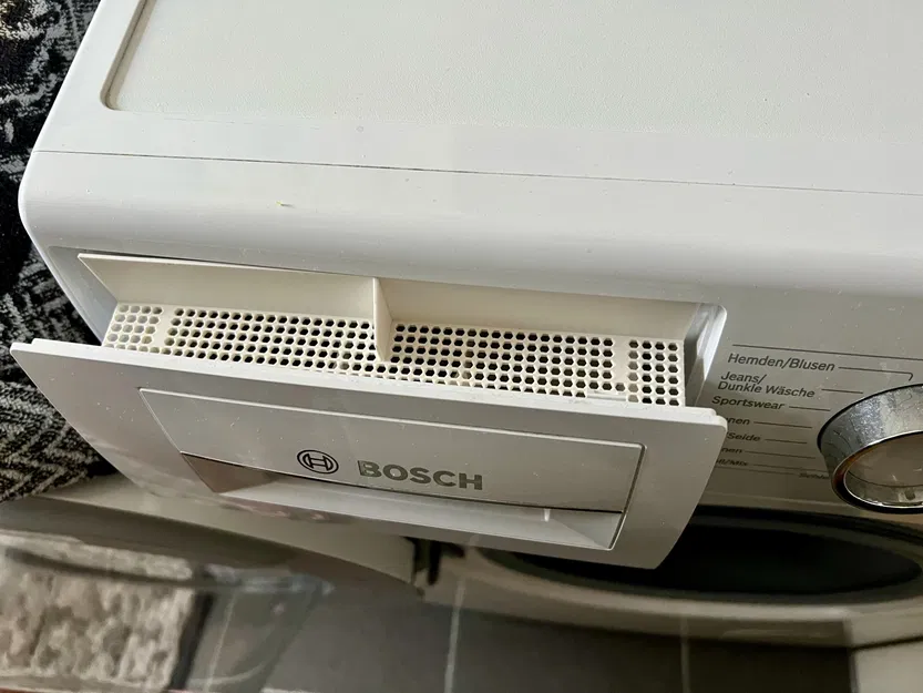 Nắp che cho ngăn chứa bột giặt máy giặt - Image 1