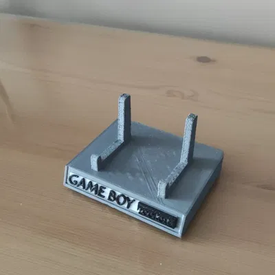 Giá đỡ cho máy chơi game cầm tay Game Boy Pocket