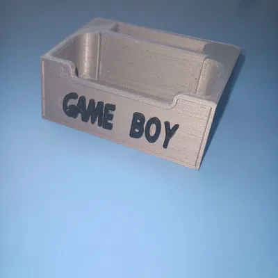 Giá đỡ cho máy chơi game cầm tay Game Boy