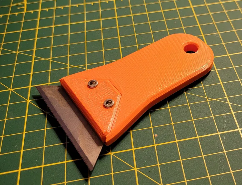 Công cụ cạo sắc bén với lưỡi dao utility tiêu chuẩn - Image 1