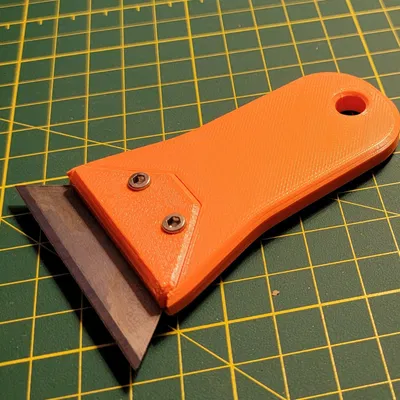 Công cụ cạo sắc bén với lưỡi dao utility tiêu chuẩn