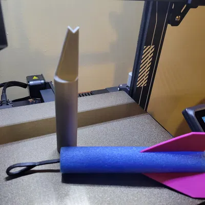 Bệ phóng tên lửa dây cao su Thing Flinger