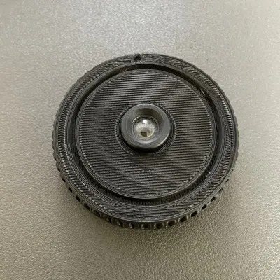 Ống kính máy ảnh dùng một lần trên bộ chuyển đổi EF-M