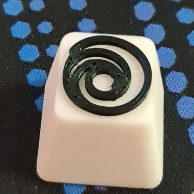 Núm phím Ubisoft in màu trắng và đen