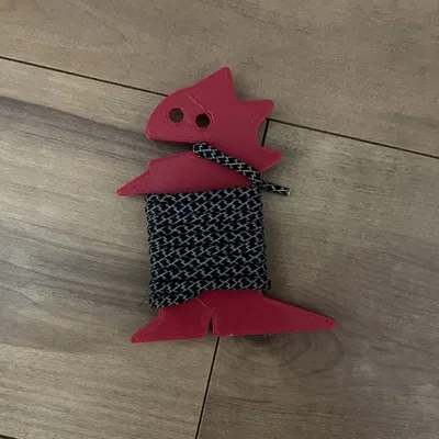 Con khủng long đáng yêu cuộn dây điện