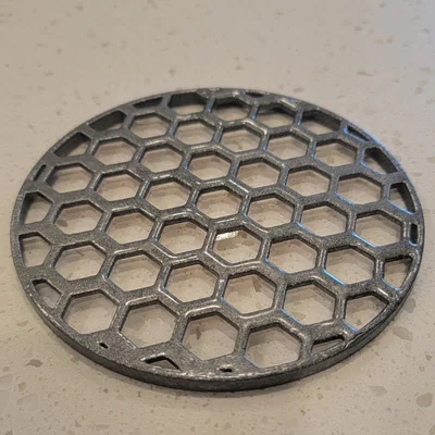 Đế lót ly tròn với lỗ hình tổ ong