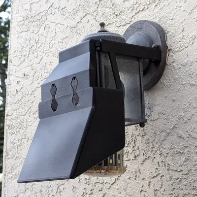 Mái che đèn ngoài trời gắn kẹp cho ánh sáng dịu hơn