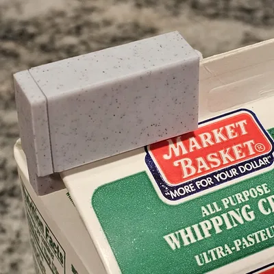 Kẹp giữ nắp hộp sữa an toàn và chắc chắn