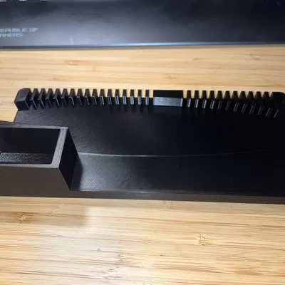 Giá đỡ PS3 đứng dọc với ngăn chứa điều khiển từ xa