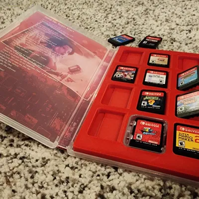 Giá đỡ cartridge cho Nintendo Switch từ hộp game có sẵn