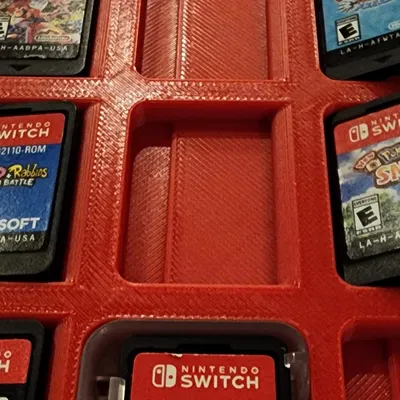 Giá đỡ cartridge cho Nintendo Switch từ hộp game có sẵn