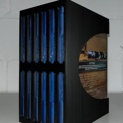 Giá đỡ Blu-ray cho 6 hộp với chiều rộng tối đa 13 mm