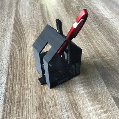 Giá đỡ bút hình tòa nhà kiến trúc