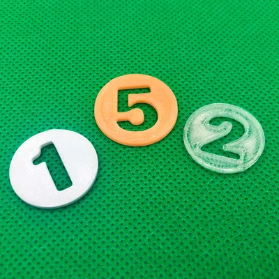 Bộ tiền xu vàng với các mệnh giá 1, 2 và 5