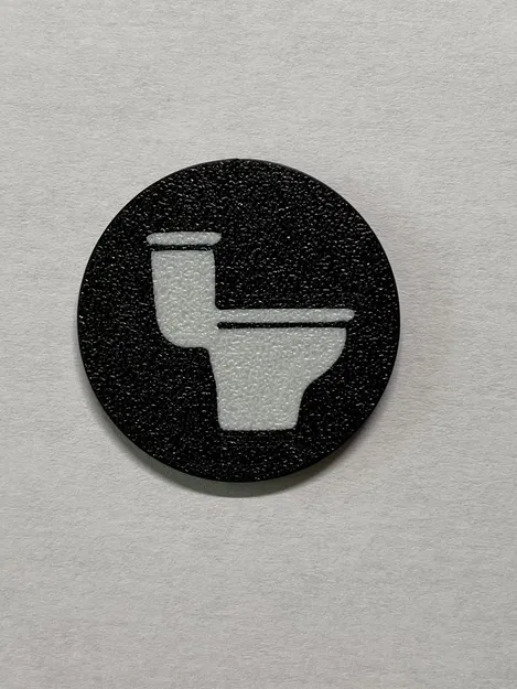 Token vệ sinh hai màu với biểu tượng nhà vệ sinh - Image 1