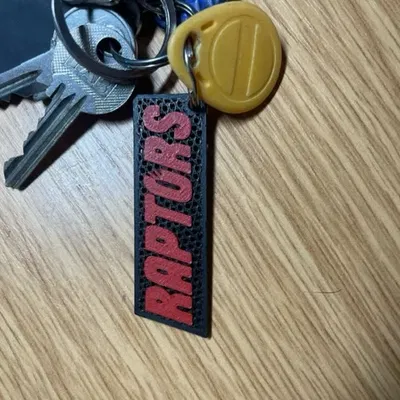 Móc khóa hình raptor độc đáo cho tín đồ bóng đá