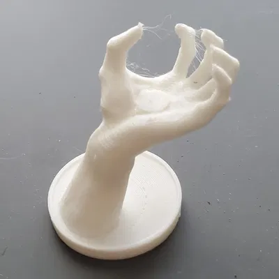 Giá đỡ hình bàn tay độc đáo cho laptop