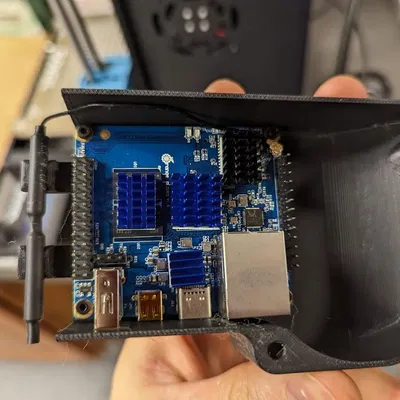 Giá đỡ Orange Pi Zero 2 gắn trên quạt PSU để làm mát chủ động