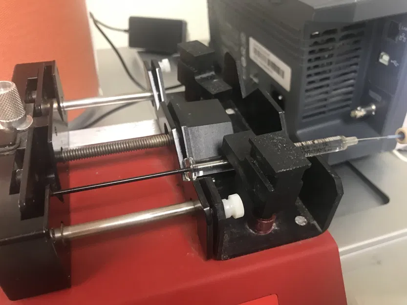 Cánh tay kẹp thay thế cho bơm tiêm NE-4000 của New Era - Image 5