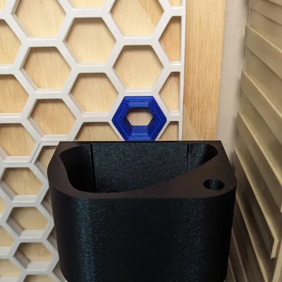 Giá đỡ chuột Logitech M570 với khoang lưu trữ hình tổ ong