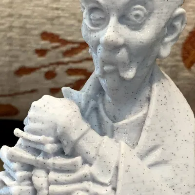 Tượng bán thân Uncle Jacob tại Biệt thự Ma quái Disney