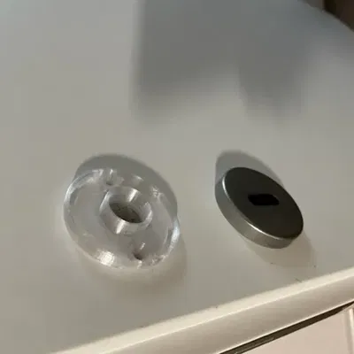 Phụ kiện nhựa dưới rosette cửa bị hỏng cần thay thế